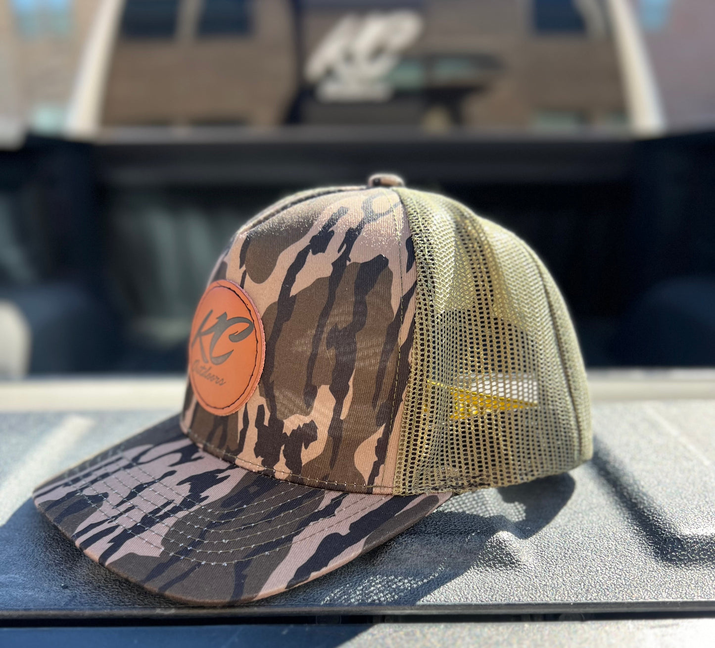 KC BOTTOMLAND LEATHER PATCH TRUCKER HAT